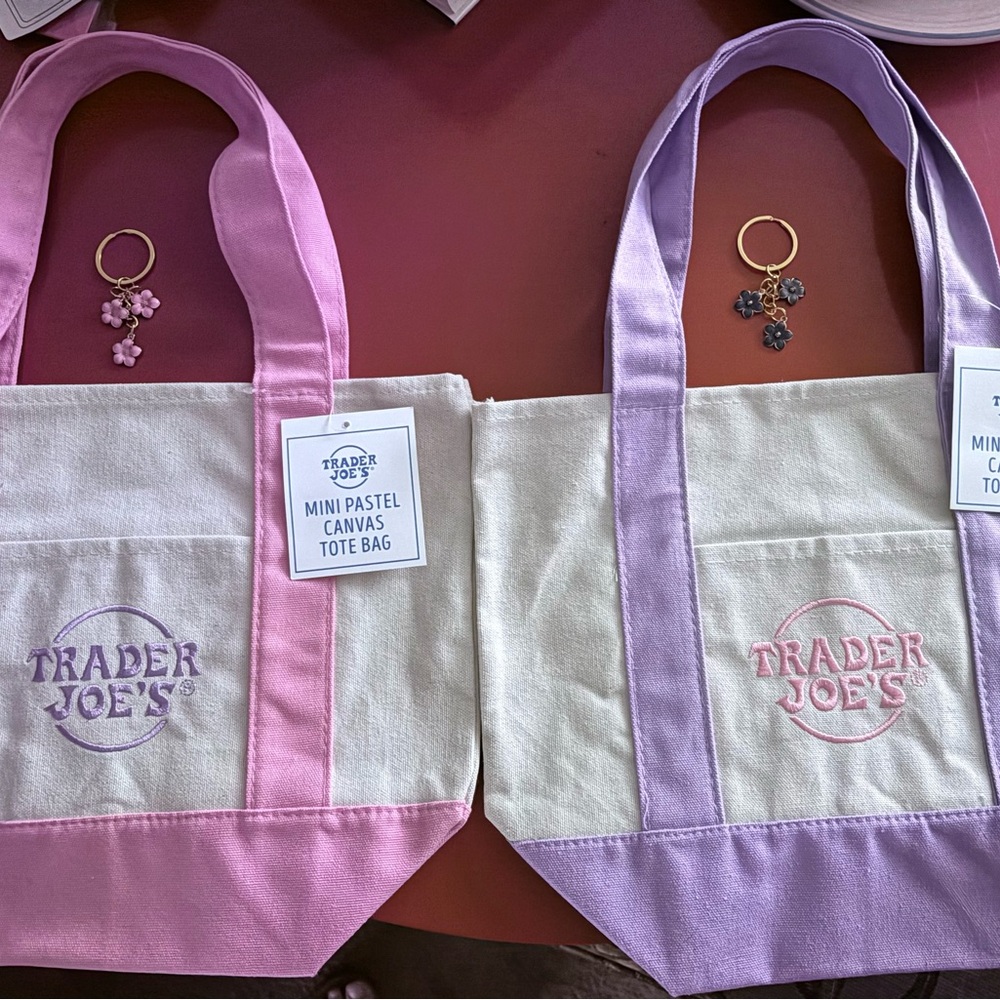Trader Joe’s NWT Pink and Purple Canvas Mini Totes. You get BOTH! 🥰